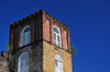 Belize City, Belize: St. John's Anglican cathedral - tower detail - built by slaves using bricks brought from Britain as ship ballast - photo by M.Torres