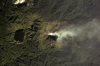 Bougainville Island: Bagana volcano, located in the central part of the island, during an eruption - smoke plume - satellite photo by NASA, Earth Sciences and Image Analysis Laboratory, Johnson Space Centre (in PD)