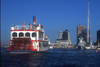 Vancouver, BC, Canada: paddlewheel boat in Burrad Indlet - city skyline and cruise ship at Canada Place pier - photo by D.Smith