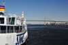 Montreal, Quebec, Canada: boat Louis Jolliet and Jacques Cartier bridge over the Saint Lawrence River - Quai de l'Horloge - Vieux-Port - photo by M.Torres