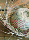 El Catey, Saman province, Dominican republic: straw hat with loose edges - Saman El Catey International Airport - photo by M.Torres