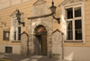 Estonia - Tallinn: richly decorated door - House of the Brotherhood of Blackheads - unmarried merchants, who took their name from their patron saint, the black St.Maurice whose head is depicted in the brotherhood's coat of arms above the door - Pikk 26 - photo by C.Schmidt