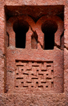 Lalibela, Amhara region, Ethiopia: Bet Medhane Alem rock-hewn church - window with geometrical motives - photo by M.Torres