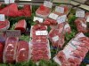 France - Lyon / Lyons: meat for sale at a butcher / boucher (photo by Robert Ziff)