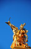 Paris, France: Pont Alexandre III - bronze equestrian group symbolizing Pegasus held by thesword brandishing Fame of Industry / War, Renomme de l'Industrie / Guerre - left bank - Quai d'Orsay - sculptor Clment Steiner - photo by M.Torres