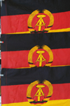 Germany - Berlin: flags of the former GDR are sold as souveniers by traders at Checkpoint Charlie (photo by W.Schmidt)