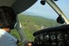 Bubaque Island, Bijags Archipelago - UNESCO biosphere reserve, Bubaque sector, Bolama region, Guinea Bissau / Guin Bissau: cockpit of a Piper PA-28 Cherokee aircraft, aerial view from Bubaque island / avio, cockpit, vista area da ilha de Bubaque - photo by R.V.Lopes