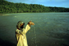 India - Uttaranchal - Rishikesh: pilgrim praying at the Ganges - photo by W.Allgwer