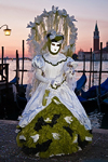 Carnival participant with Carnival costume at Dawn by Canale di San Marco, Venice - photo by A.Beaton