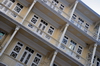 Macau, China: balconies on a colonial faade - photo by M.Torres