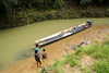 Skandis, Lubok Antu District, Sarawak, Borneo, Malaysia: long boat, outside the Iban longhouse - Kesit River - photo by A.Ferrari