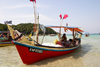 Malaysia - Pulau Perhentian / Perhentian Island, Terengganu: fisherman in his boat (photo by Jez Tryner)