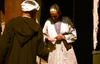 Morocco / Maroc - Fs: merchant in the medina - checking a payment - man wearing a jallaba - photo by F.Rigaud