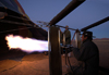 Namibia: Hot Air Balloonride preparation - filling the balloon - flames, Sossusvlei - photo by B.Cain