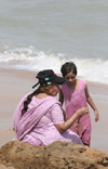 Karachi, Sindh, Pakistan: girl with her grandmother at the beach - photo by R.Zafar