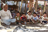 Presidente Hayes department, Paraguay: Maka indians near Puente Remanso - elderly man with the village's children - photo by A.Chang