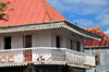 Saint-Denis, Runion: red roof and creole balcony - corner of Pasteur and Paris street - photo by M.Torres