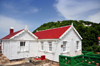 Windwardside, Saba: in this cottage you can see the pipes that connect the roofs to the underground cistern, allowing rain water to be stored - photo by M.Torres