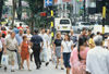 Singapore: people on Orchard road - corner with Bideford rd. (photo by S.Lovegrove / Picture Tasmania)