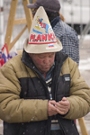 spectators using mobile phone - Planica ski jumping championships, Slovenia - photo by I.Middleton