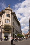 art deco - Centromerkur department store building with a statue of Mercury, the god of commerce - city centre, Ljubljana, Slovenia - photo by I.Middleton