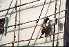 Thailand - Ranong: painting with bamboo scaffolding (photo by Jordan Banks)