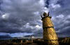 Lhasa, Tibet: Jokhang Monastery - on the roof - gilded tower and Potala Palace - photo by Y.Xu