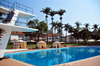 Entebbe, Wakiso District, Uganda: Laico Lake Victoria Hotel - pool view with jumps platform - photo by M.Torres