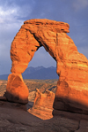 Arches National Park, Utah, USA: Delicate Arch, the most famous and one of the parks most beautiful, glows in the late afternoon sun - photo by C.Lovell