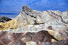 Death Valley National Park, California, USA: Zabriskie Point - Manly Beacon, a rock formation that stands like a shark fin in the horizon - photo by M.Torres