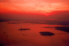 Hudson river (New York): dusk over Ellis Island and the Statue of Liberty - New Jersey on the right  (photo by Miguel Torres)