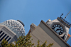 Louisville, Kentucky, USA: old and new architecture - clock tower of the old German Insurance Bank and view along West Market Street towards Aegon tower dome - photo by M.Torres