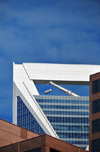 Charlotte, North Carolina, USA: Duke Energy Center framed by the Bank of America tower - postmodernism by architects Thompson, Ventulett, Stainback & Associates - South Tryon Street - photo by M.Torres