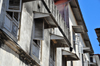 Stone Town, Zanzibar, Tanzania: windows with roofs and shutters - Shangani - photo by M.Torres