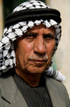 Hebron, West Bank, Palestine: portrait of local man wearing a keffiyeh scarf - photo by J.Pemberton