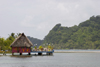 bar on stilts over the Caribbean sea - Isla Grande, Coln, Panama, Central America - photo by H.Olarte